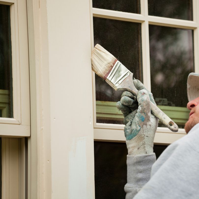 Exterior painting with scaffold and weather safe coatings near Menai Bridge