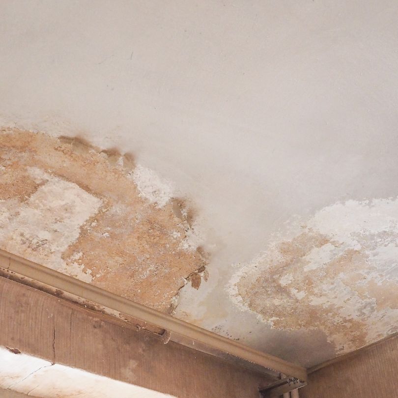 Penetrating damp investigation around chimneys, walls and gutters