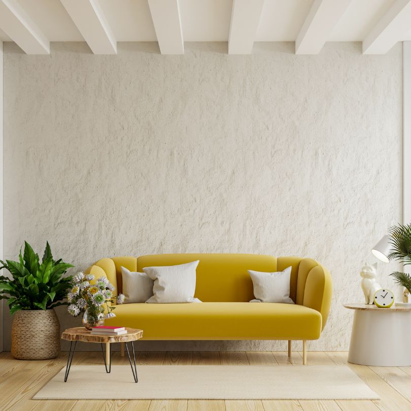 Local plasterer finishing a living room wall